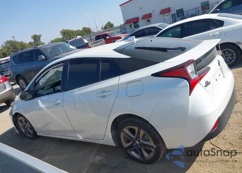 2021 Toyota Prius Xle z USA, uszkodzony, nr VIN JTDKAMFU9M3130578